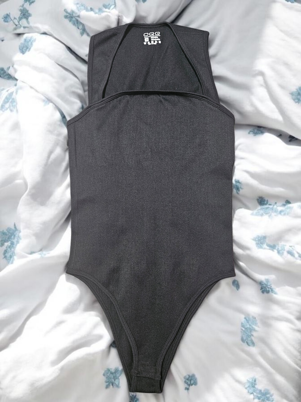OQQ Women's Black Ribbed Sleeveless One-Piece Bodysuit - Never Worn